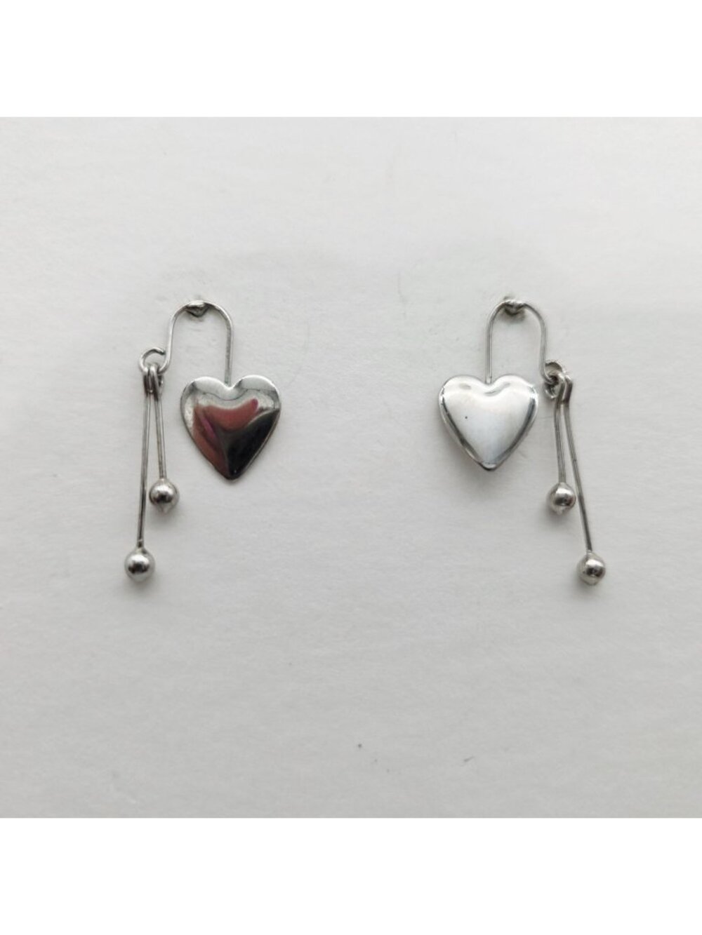 Heart-Shaped Silver Tone Drop Earrings With Ball Accents 1"